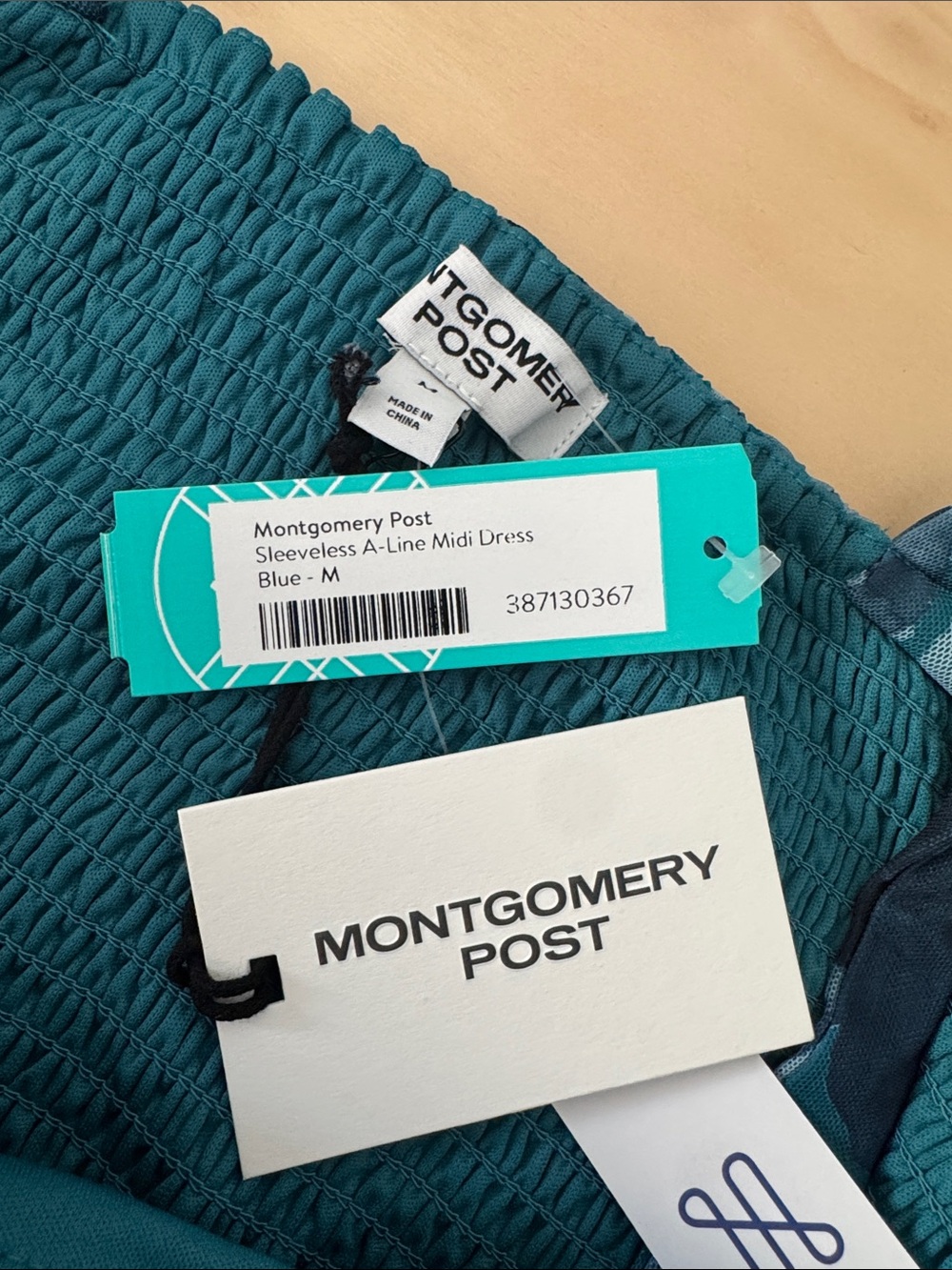 NEW! Stitch Fix Montgomery Ward
Teal Floral Midi Dress with Ruched Bodice - Picture 6 of 6